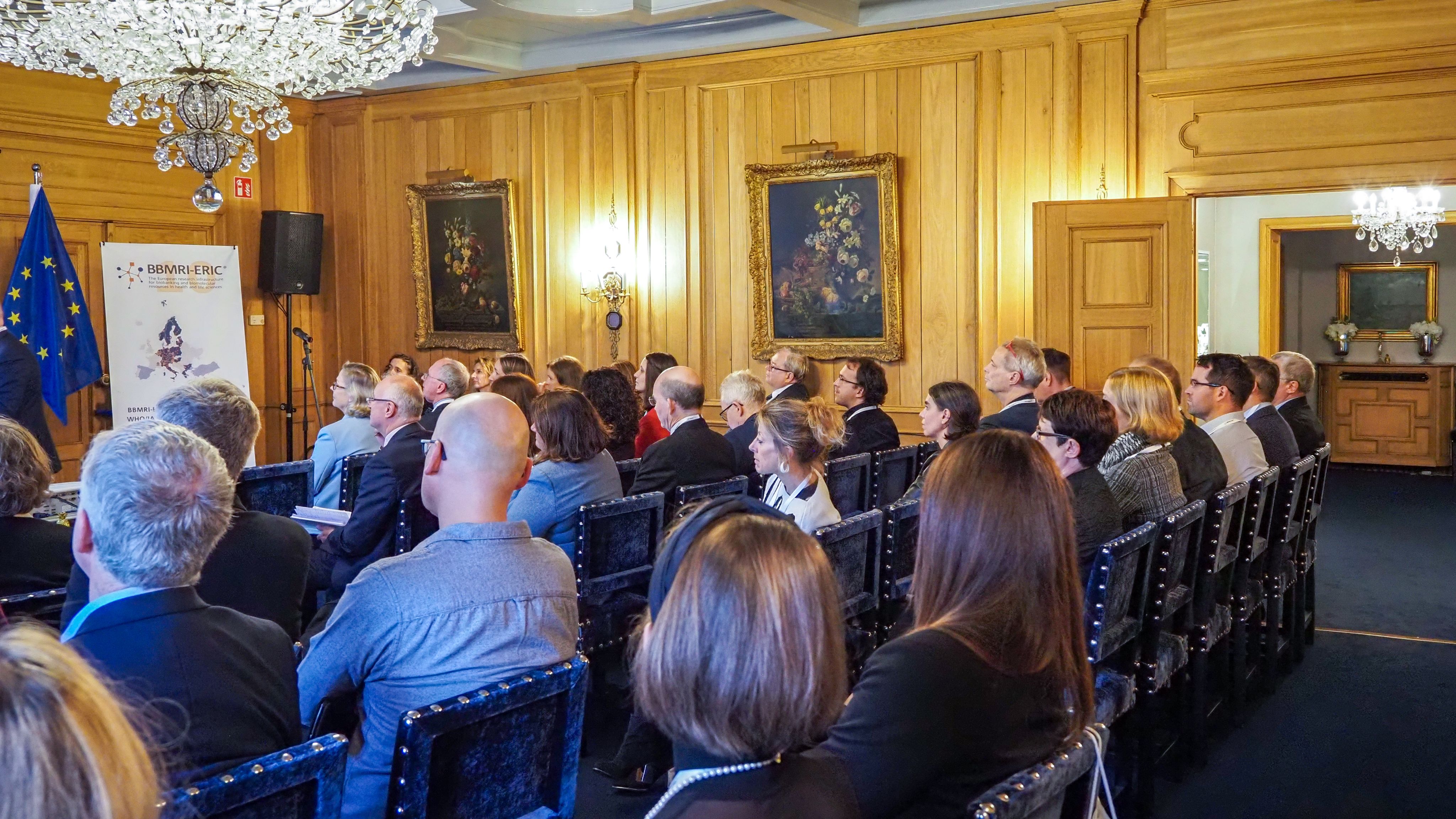 The picture of an audience listening to the presenter. 